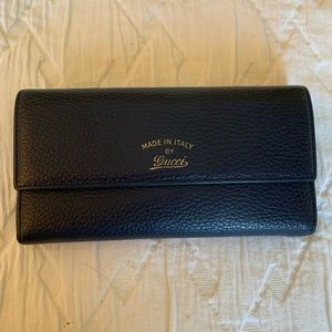 Gucci wallet.